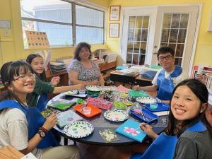 students painting