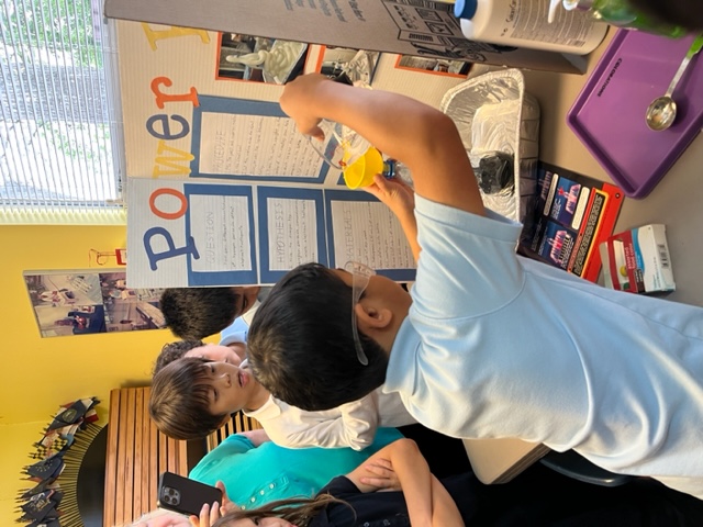 childen on science fair projects and experiments