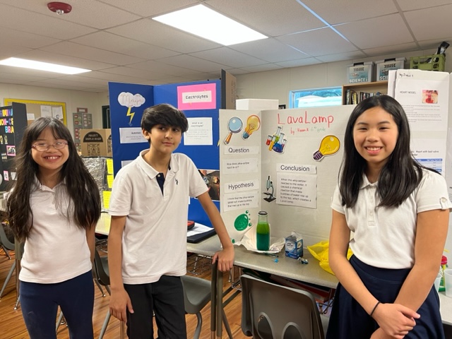 childen on science fair projects and experiments