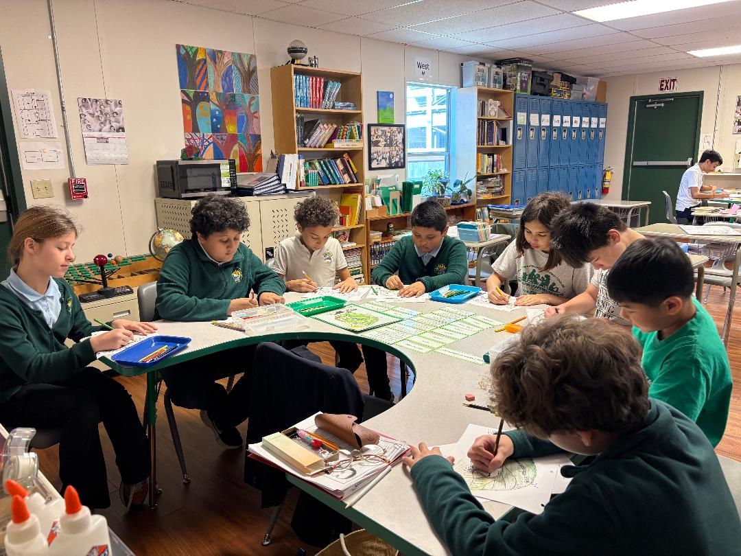 Children learning with Montessori materials in a welcoming Houston classroom